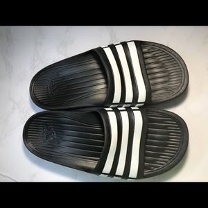 Adidas slides.